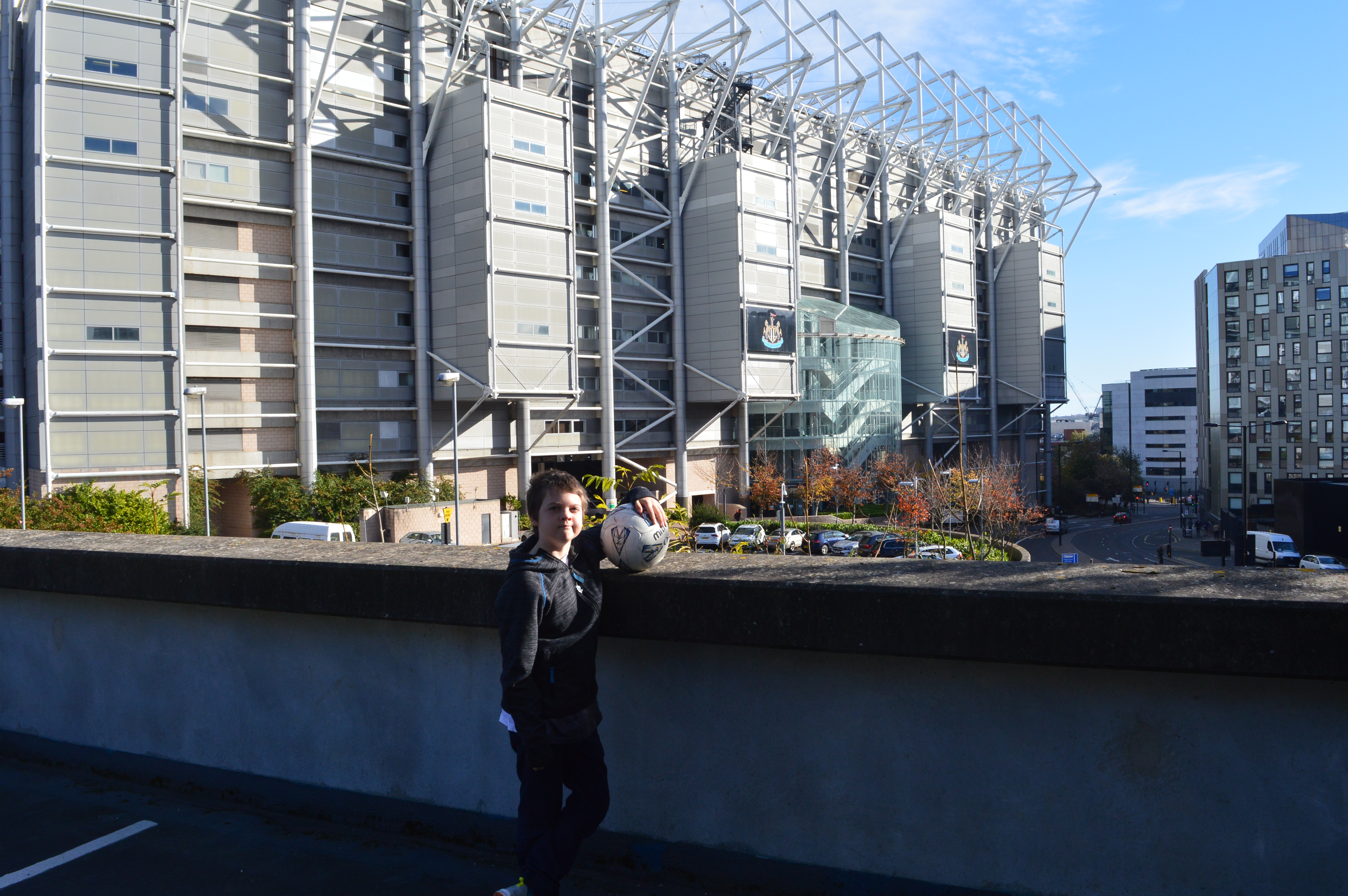 A day trip to Newcastle means a photo with Newcastle Football stadium in the background