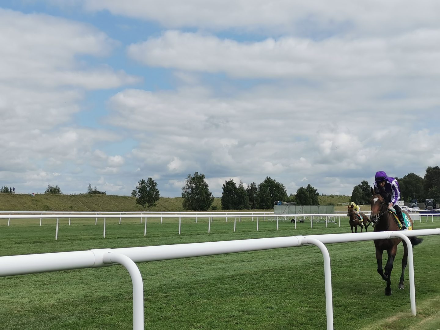 Watching the jockeys head to the start line