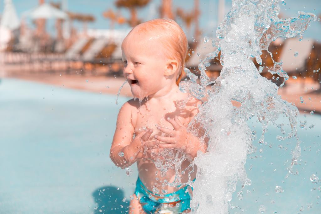 Child splashing in the water Aquatic Centre Tasmania